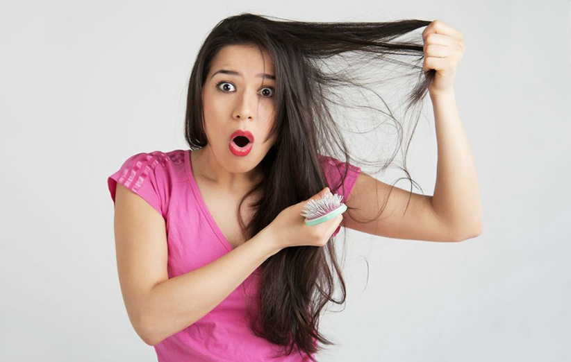 دلایل ریزش مو در خانم ها و درمان آن